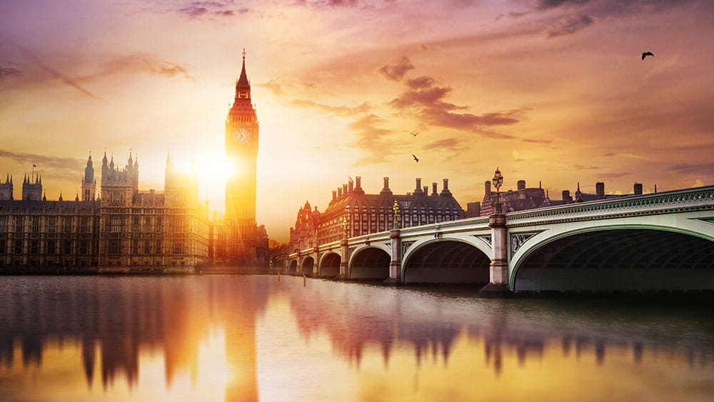 Big Ben en Westminster Bridge in de schemering