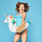 Child jumping with rubber ring